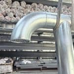 Tuyaux de ventilation de réservoirs galvanisés – Coude 90° avec bride et grillage de protection